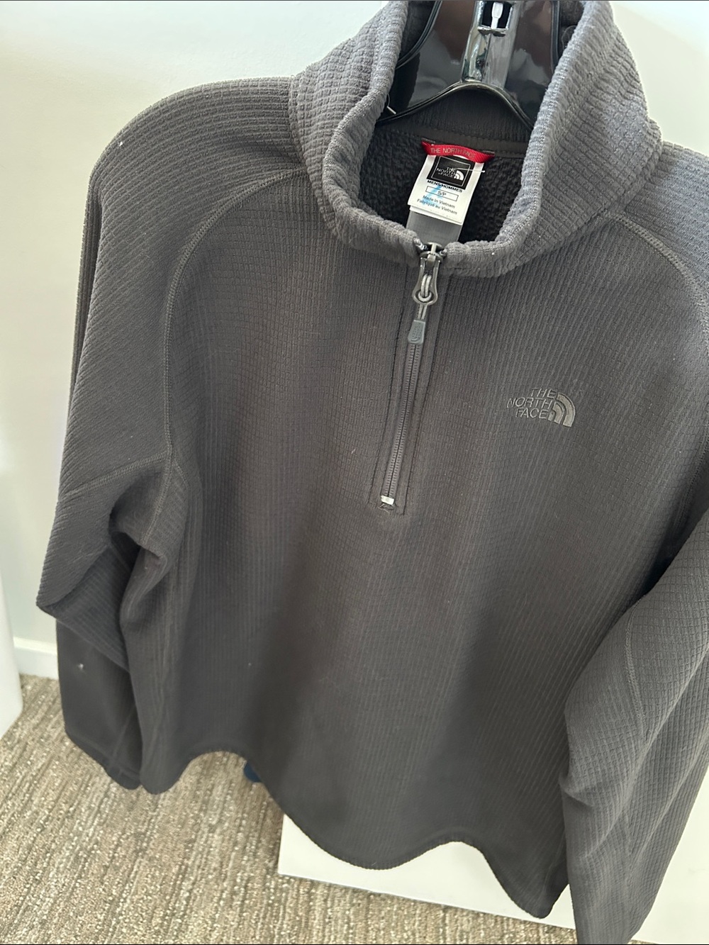 The North Face woman’s Quarter-Zip Waffle Fleece Sweater - Charcoal